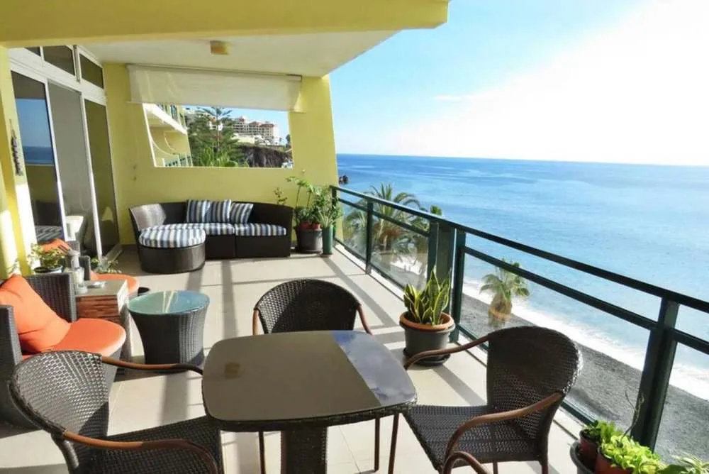 The beautiful balcony/veranda with seats and sofa to enjoy the beach and ocean view.