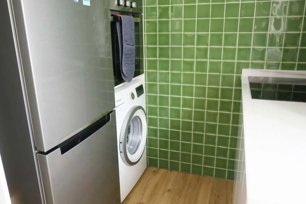 Fridge, washing machine, oven and microwave.