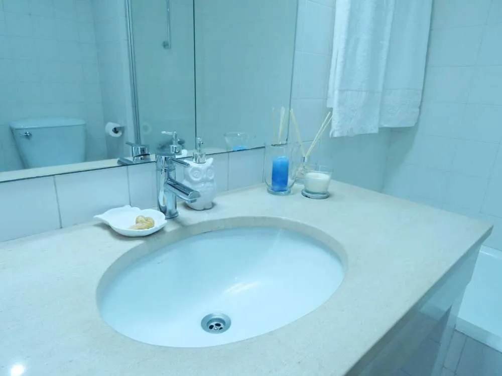 The second bathroom complete with shower, bathtub, toilet, bidet and washing machine.
