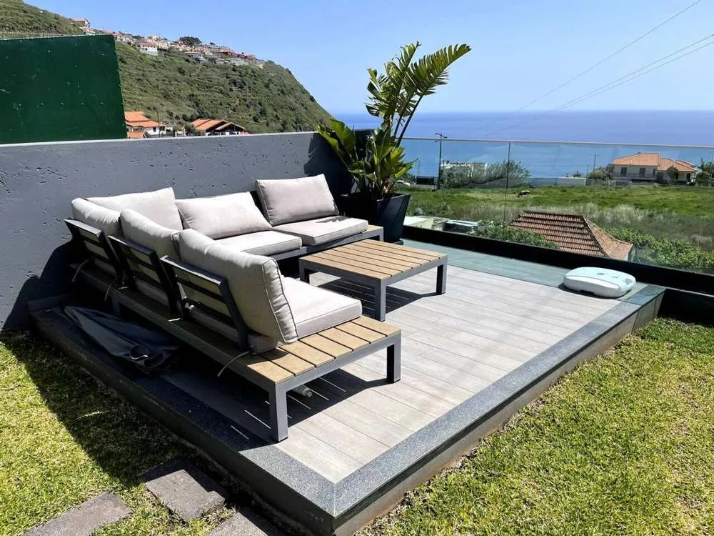 Outdoor lounging areas to take in the pool, sea and mountain views.