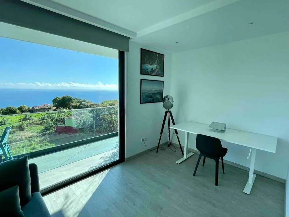 A dedicated workspace fitted with standing desk for those that need to work remotely during their stay.