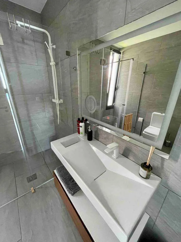 The private ensuite bathroom from the master bedroom suite.